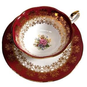 Queen's fine bone china tea cup and saucer Monarch red vintage